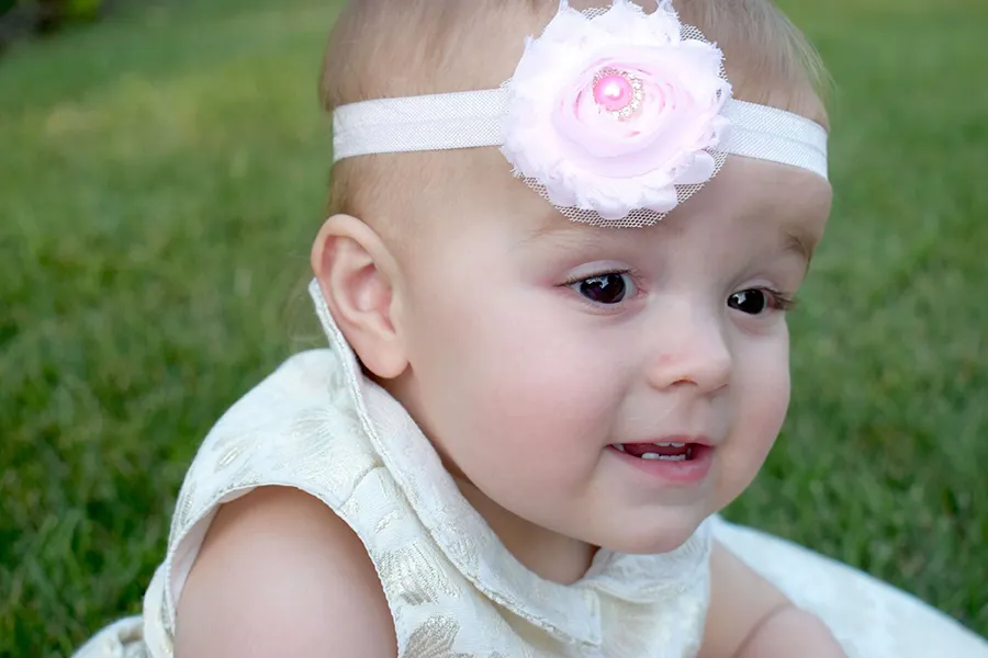 Infant receiving attentive care